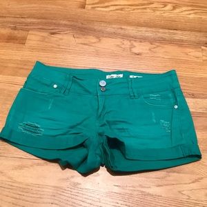 Green denim shorts